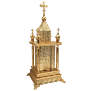 Ornate golden church model, religious artifacts, ecclesiastical decorative item, handmade liturgical ornament, Greek Orthodox church miniature.