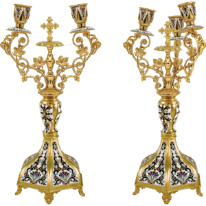 Ornate religious candleholder with gold finish, intricate enamel details, and traditional ecclesiastical design, perfect for religious ceremonies and church decor.