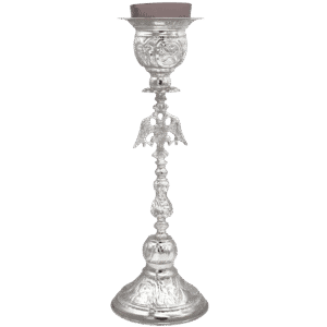 Ornate silver religious candle holder with intricate floral and angelic details, ideal for church ceremonies and ecclesiastical decorations.