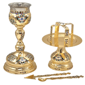 Ornate gold liturgical candles and candle holders for ecclesiastical ceremonies, featuring intricate enamel designs, ideal for church worship and religious traditions.