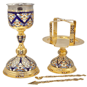 Intricate ecclesiastical chalice and holy altar set with gold and enamel details, used in Orthodox church liturgical services.