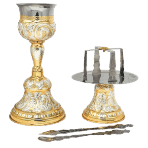 Elegant silver and gold ecclesiastical holy communion set with chalice, paten, and spoon, ideal for Orthodox church services and religious ceremonies, crafted with intricate designs.