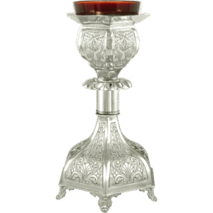 Intricately crafted silver religious candle holder for church ceremonies and Orthodox Christian rituals. Beautifully detailed, traditional ecclesiastical item for religious services.