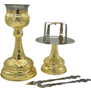 Ornate gold-plated Eucharist and liturgical items for Orthodox church ceremonies displayed on a black background.