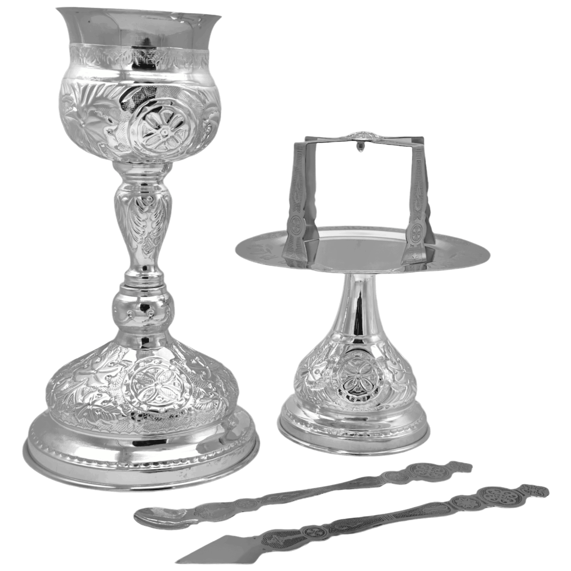 Intricately designed silver Orthodox Christian liturgical items for church services, including a chalice, altar plate, and spoon, perfect for religious ceremonies and ecclesiastical use.