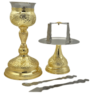 Intricately crafted gold and silver ecclesiastical liturgical items for Orthodox church services, including chalice, censer, and liturgical spoon, from Tsa tsaroni Ann Antonios, perfect for religious ceremonies.