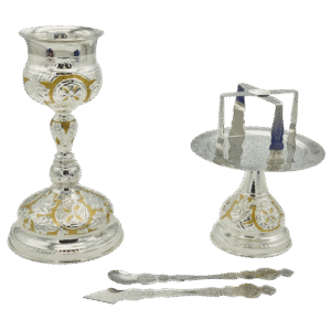 Elegant silver church liturgical items including a chalice, censer, and spoon, used for Orthodox religious services and sacred ceremonies. Perfect for ecclesiastical rituals and church decorations.