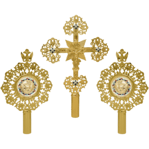 Ornate gold ecclesiastical religious items including a cross and medallions, used in Orthodox Christian ceremonies, showcasing detailed craftsmanship and traditional ecclesiastical designs.