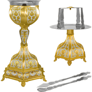 Ornate gold and silver ecclesiastical liturgical vessel set with chalice, candle holder, and consecration tongs for church religious ceremonies.
