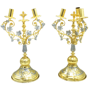 Ornate gold and silver Orthodox church candle holders with intricate detailing, ideal for religious church services and ecclesiastical decorations.