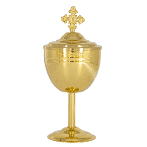 Golden liturgical chalice with a cross on top, used in Orthodox Christian church services. Elegant and ornate religious vessel for Holy Communion.