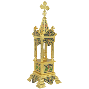 Intricate gold liturgical censer with colorful enamel details, used in Orthodox church services for burning incense.