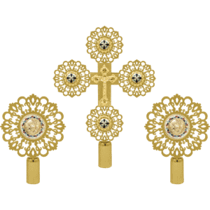 Ornate gold ecclesiastical religious items including crosses and medallions with intricate designs, used in Orthodox Christian liturgical practices.