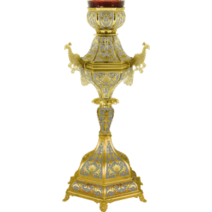 Ornate religious candle holder with gold and silver detailing, traditional ecclesiastical liturgical art, church accessories, ceremonial candle stand.