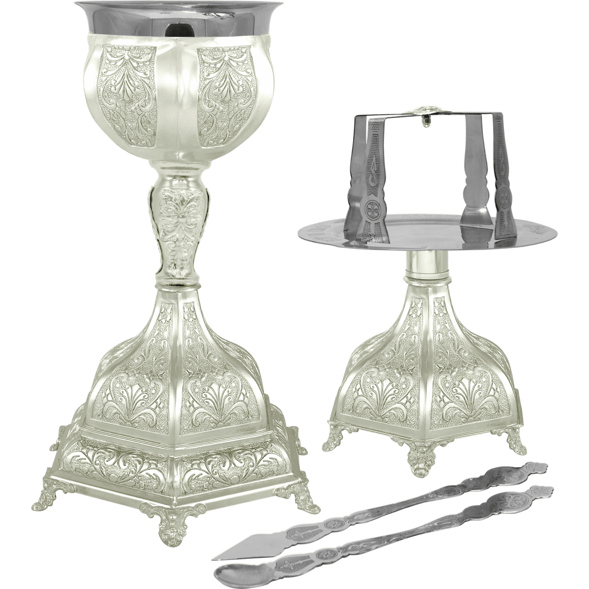 Intricate silver liturgical items for church ceremonies, including a chalice, candle holder, and sacred tongs, showcasing traditional craftsmanship and religious symbolism.