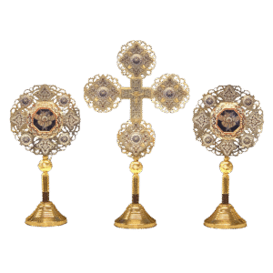 Intricate gold liturgical ecclesiastical items including crosses and icons, used for religious ceremonies and church festivities, crafted with traditional patterns and embellishments.