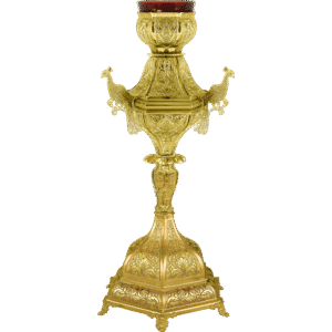 Ornate gold religious candleholder with intricate engraving, perfect for church ceremonies and icon veneration.