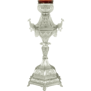 Intricately crafted silver religious candle holder with ornate religious symbols and detailed engravings for church ceremonies and sacred events.