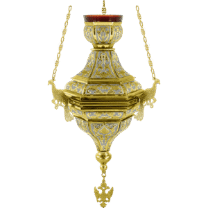 Intricate gold and silver censer for church rituals, featuring ornate filigree work and chain attachments, used in Orthodox liturgical ceremonies.