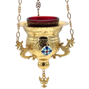 Ornate gold ecclesiastical censer with intricate dragon or lion-shaped handles, used in Orthodox Christian religious ceremonies, showcasing traditional church supplies and religious artifacts.
