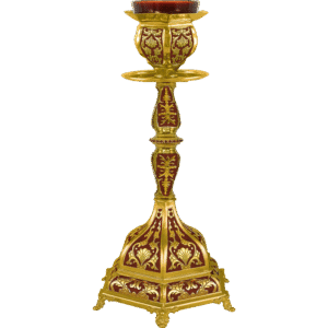 Intricate gold and red liturgical candle holder with ornate design, used in Orthodox Christian church services and religious ceremonies.