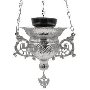 Antique silver church hanging lantern for ecclesiastical ceremonies, traditional religious liturgical equipment, ornate religious church lamp for Orthodox rituals.