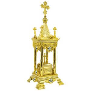 Intricate golden religious ornament with crosses, elaborate detailing, and decorative motifs, representing traditional ecclesiastical artifacts from Tsa-tza-ronis Antónios, used in Orthodox Christian church services.