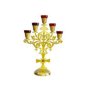 Intricate gold metal candelabrum with red glass candle holders, used for church ceremonies and religious services, representing sacred religious artifacts and ecclesiastical liturgical items.