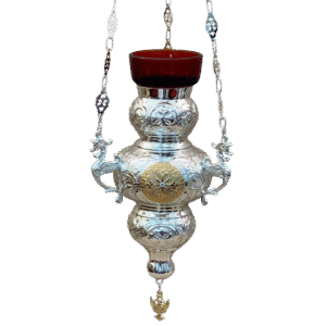 Intricately designed silver church lantern with red glass holder, traditional ecclesiastical ornament, handcrafted religious item, Orthodox church decor, religious lighting accessory.